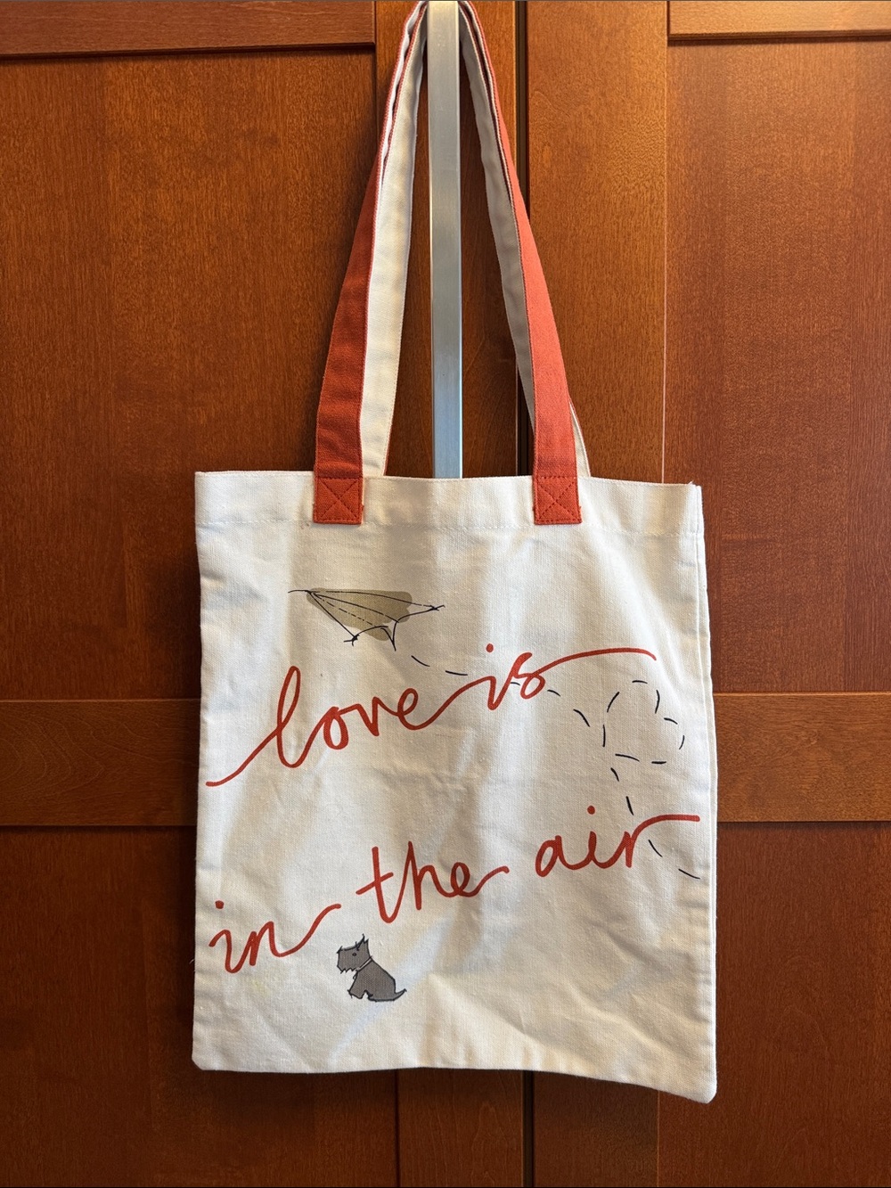 RADLEY LONDON Cream Canvas Tote with Coral Straps and Script Graphic